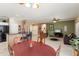 Open-concept living areas are ideal for gatherings, showcasing the kitchen, dining, and living rooms at 20473 N Desert Sage Ln, Surprise, AZ 85374