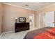 Comfortable bedroom with lots of natural light and neutral colors, and ensuite bathroom access at 20473 N Desert Sage Ln, Surprise, AZ 85374
