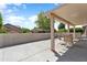 Enjoy outdoor living on this covered patio with ample seating and scenic views at 20473 N Desert Sage Ln, Surprise, AZ 85374