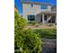 Exterior view of a home with a well-manicured backyard, patio, and landscaping features at 22026 N 28Th Pl, Phoenix, AZ 85050