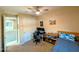 Cozy bedroom featuring neutral tones and ample natural light from the adjacent room at 22026 N 28Th Pl, Phoenix, AZ 85050