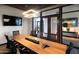 Modern conference room featuring a sleek table and comfortable chairs, ideal for productive meetings at 22026 N 28Th Pl, Phoenix, AZ 85050
