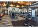 Well-equipped gym featuring treadmills, weights, and various exercise machines for a complete workout at 22026 N 28Th Pl, Phoenix, AZ 85050