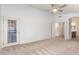 This spacious bedroom leads to the bathroom and has an exterior door at 2233 S Nielson St, Gilbert, AZ 85295