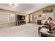 Spacious living room with vaulted ceilings, carpet, natural light, and comfortable seating at 2233 S Nielson St, Gilbert, AZ 85295