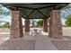 View of a picnic table in a pavilion structure surrounded by shady trees at 2233 S Nielson St, Gilbert, AZ 85295