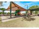 Shaded community playground featuring slides and climbing structures for outdoor fun at 2233 S Nielson St, Gilbert, AZ 85295