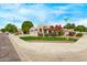 A charming single-Gathering home with mature landscaping and a well-kept lawn on a quiet street at 2233 S Nielson St, Gilbert, AZ 85295