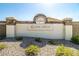 Entrance to an active adult community with a stone sign and well-maintained landscaping at 22940 W Desert Bloom St, Buckeye, AZ 85326
