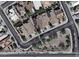 Overhead street view of neighborhood featuring well-maintained homes, landscaping, and nearby street access at 22940 W Desert Bloom St, Buckeye, AZ 85326