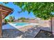 A refreshing backyard pool awaits under mature shade trees at 2322 E Dolphin Ave, Mesa, AZ 85204