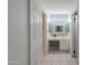 Ensuite bathroom features vanity, great lighting and white tile flooring at 2322 E Dolphin Ave, Mesa, AZ 85204