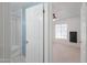 View from a bedroom into a bathroom, featuring light walls and tiling at 2322 E Dolphin Ave, Mesa, AZ 85204