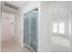 View of a hallway with a storage closet and bedroom at 2322 E Dolphin Ave, Mesa, AZ 85204