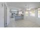 Eat-in kitchen featuring light-blue cabinets, tile floor, and lots of natural light at 2322 E Dolphin Ave, Mesa, AZ 85204