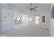 Spacious living room with an open layout, connecting to the kitchen and dining area at 2322 E Dolphin Ave, Mesa, AZ 85204