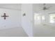 Bright and airy living room leading to the dining area with ample natural light and carpeted flooring at 2322 E Dolphin Ave, Mesa, AZ 85204