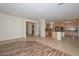 Bright, open layout featuring a kitchen island with bar seating and stainless steel appliances at 248 S 167Th Dr, Goodyear, AZ 85338