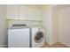 This home has a convenient laundry room that includes a washer, dryer, and plenty of storage at 248 S 167Th Dr, Goodyear, AZ 85338