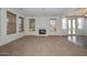 Open living space with fireplace and backyard access. Great natural light at 248 S 167Th Dr, Goodyear, AZ 85338