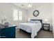 Well-lit bedroom with shutters, fan, side tables and decorative touches; bright and clean at 2511 W Queen Creek Rd # 262, Chandler, AZ 85248