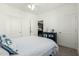 Bright bedroom with white walls and ceiling fan at 2511 W Queen Creek Rd # 262, Chandler, AZ 85248