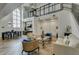 Beautifully decorated lobby with a seating area and a staircase leading to the second floor at 2511 W Queen Creek Rd # 262, Chandler, AZ 85248