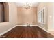 Spacious dining room featuring wood floors and natural light at 2753 E Kenwood St, Mesa, AZ 85213