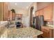 Well-equipped kitchen with granite countertops and stainless steel appliances at 2753 E Kenwood St, Mesa, AZ 85213