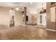 Spacious living room with arched doorways and tile flooring at 2753 E Kenwood St, Mesa, AZ 85213