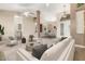 Bright living room featuring vaulted ceilings and an open layout to the dining area for seamless entertaining at 2753 E Kenwood St, Mesa, AZ 85213