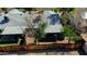 A bird's eye view of backyard with a fence, landscaping, and a covered patio at 3106 W Mohawk Ln, Phoenix, AZ 85027
