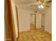 This bedroom features neutral walls, wood-look flooring, closet, and overhead fan at 3106 W Mohawk Ln, Phoenix, AZ 85027