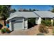 A single-story house featuring a one car garage and desert landscaping at 3106 W Mohawk Ln, Phoenix, AZ 85027