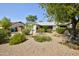 Beautiful single-story house with a well-kept yard of desert landscaping and healthy green shrubbery at 3106 W Mohawk Ln, Phoenix, AZ 85027