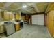 Spacious garage with utility sink, laundry hookups, and ample storage space at 3106 W Mohawk Ln, Phoenix, AZ 85027
