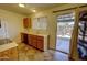 A well kept kitchen with ample counter space and a doorway leading out to the patio at 3106 W Mohawk Ln, Phoenix, AZ 85027