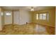 Spacious living room featuring light walls, tile floors, and a window seat area at 3106 W Mohawk Ln, Phoenix, AZ 85027