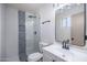 Modern bathroom featuring new vanity, glass shower, and custom tile at 3231 W Willow Ave, Phoenix, AZ 85029