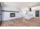Inviting living room features a brick fireplace and flows into the updated, modern kitchen at 3231 W Willow Ave, Phoenix, AZ 85029