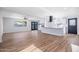 Open living room showcasing beautiful flooring and natural light, creating an inviting atmosphere at 3231 W Willow Ave, Phoenix, AZ 85029