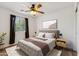 Inviting bedroom with a comfy bed, neutral color scheme, and ample natural light at 3370 E Flamingo Ct, Gilbert, AZ 85297