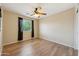 Comfortable bedroom features a window with blinds for privacy and a ceiling fan for climate control at 3370 E Flamingo Ct, Gilbert, AZ 85297