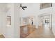Open concept living area with tile and wood flooring and white walls at 3370 E Flamingo Ct, Gilbert, AZ 85297