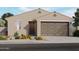 Charming single-story home featuring desert landscaping, neutral tones and an attached two-car garage at 3626 E Audrey Dr, San Tan Valley, AZ 85143