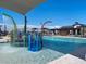 Community splash pad featuring colorful water features and play equipment for and lounge seating at 3626 E Audrey Dr, San Tan Valley, AZ 85143