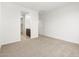 Bedroom with neutral carpet with attached closet and bathroom at 37084 W Prado St, Maricopa, AZ 85138
