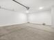 Spacious two car garage with ample space for vehicles at 37084 W Prado St, Maricopa, AZ 85138