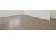 Neutral-toned tile flooring provides a clean and modern foundation for any interior design at 37084 W Prado St, Maricopa, AZ 85138