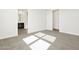 Bathroom featuring tiled floors and shower with clear glass doors at 37111 W Prado St, Maricopa, AZ 85138